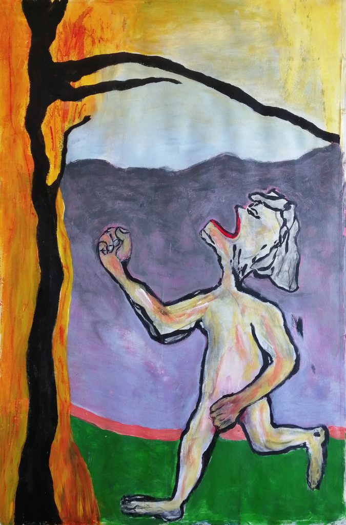 Angry man that uplifts his fist against a burning tree